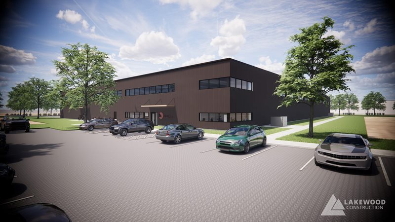 Metal Flow Exterior Rendering of new brick building including parking lot with six cars, trees, and sidewalks